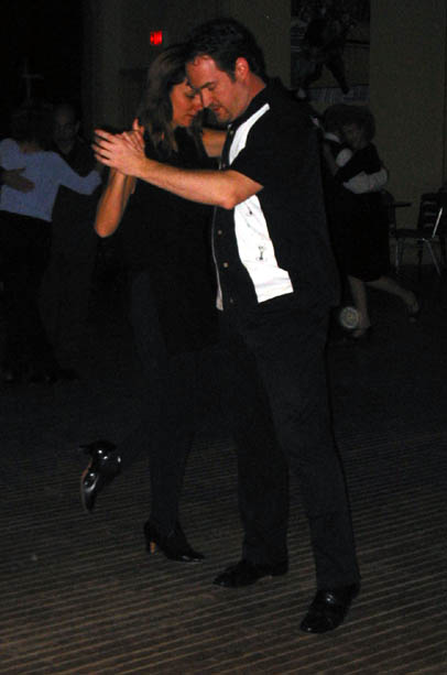 Jim, Beth and others dance at the during the intermission to Djed Music